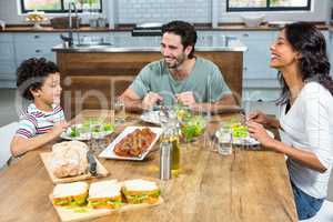 Happy family having lunch together