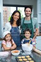 Portrait of happy family in the kitchen