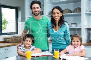 Smiling family in the kitchen