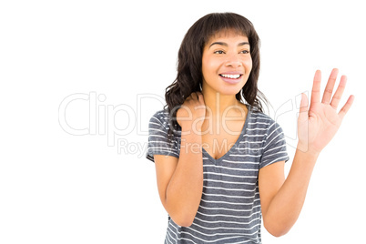 Smiling casual woman touching something