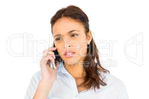 Worried casual woman on phone