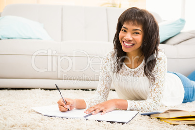 Smiling woman working on floor