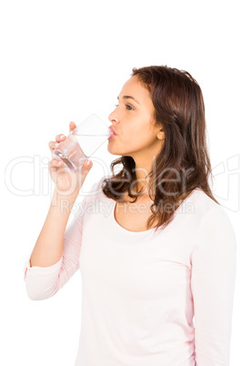 Gorgeous woman drinking a glass of water