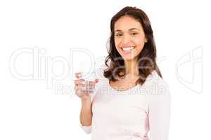 Smiling woman holding glass of water