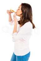 Casual woman eating a slice of pizza