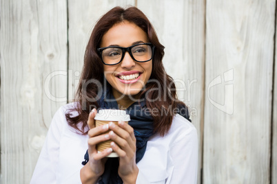 Hipster woman with take-away coffee