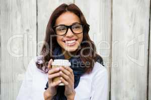 Hipster woman with take-away coffee