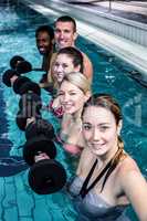 Fitness group doing aqua aerobics