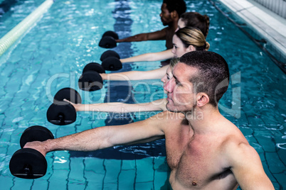 Fitness group doing aqua aerobics