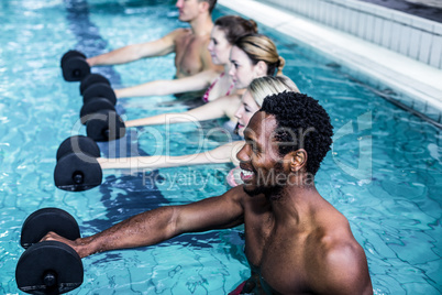 Fitness group doing aqua aerobics