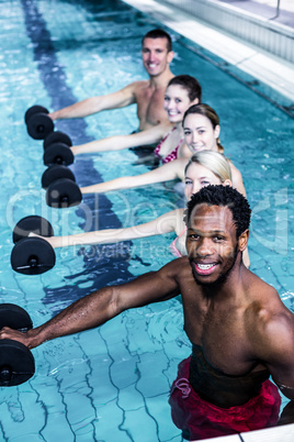 Fitness group doing aqua aerobics