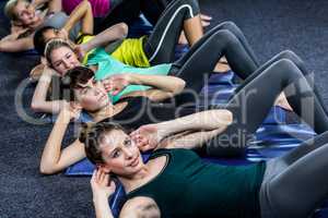 Fit smiling group working abs