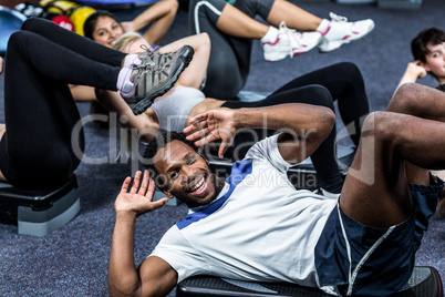 Group of people working their abs