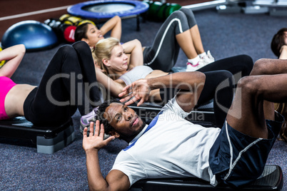 Group of people working their abs