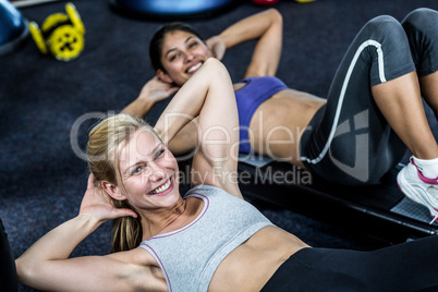 Pretty women working their abs