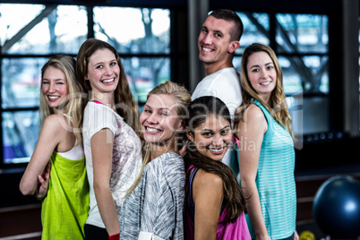 Dancer smiling group posing together