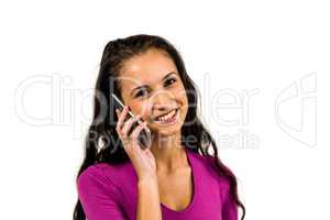 Smiling woman on a phone call looking at the camera