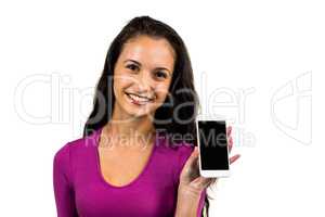 Smiling woman showing smartphone screen while looking at camera