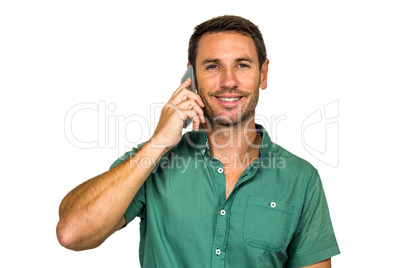 Man on phone call smiling at camera
