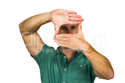 Man making frame with hands