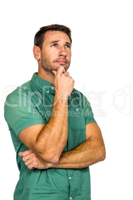Thoughtful man with hand on chin looking away