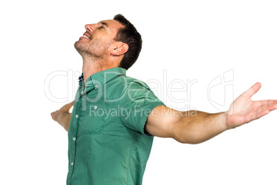 Peaceful man with closed eyes and arms outstretched