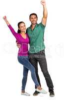 Happy couple raising fists