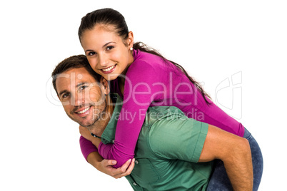 Smart man giving piggy back to his girlfriend