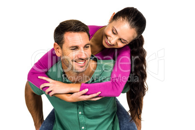 Man with piggy back to his girlfriend