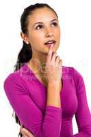 Thoughtful woman with finger on mouth