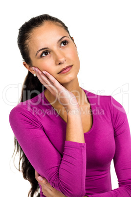 Thoughtful woman with hand on cheek