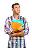 Man standing and holding notepads