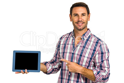 Man showing tablet screen at camera