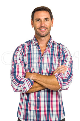 Portrait of smiling man with arms crossed