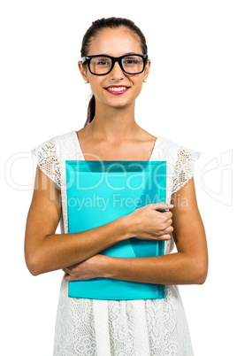 Smiling woman with eyeglasses holding plastic folder