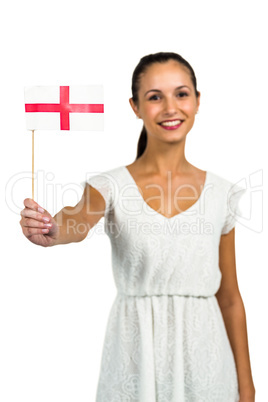 Happy woman showing England flag to the camera