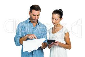 Couple calculating bills