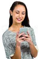 Smiling woman using smartphone