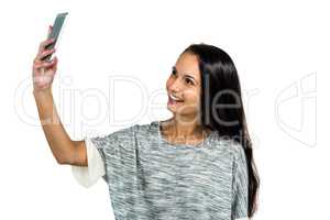 Happy woman taking selfie