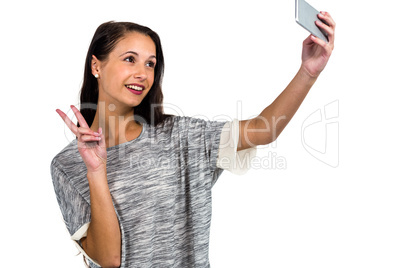 Smiling woman taking selfie