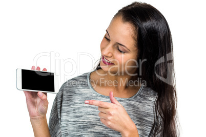 Woman showing smartphone screen at camera