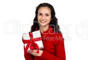 Smiling woman holding gift box