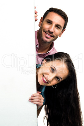 Smiling couple posing for camera Smiling couple posing for camera