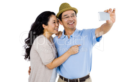 Man and woman taking a picture