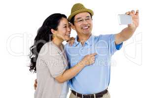 Man and woman taking a picture