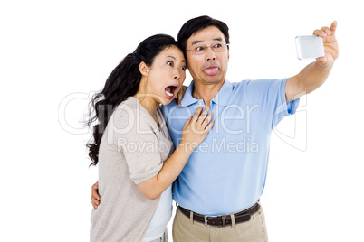 Man and woman taking a picture