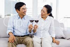 Man and woman with glasses of wine