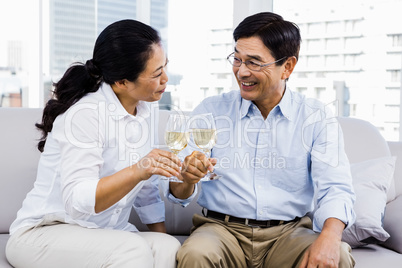 Man and woman with glasses of wine