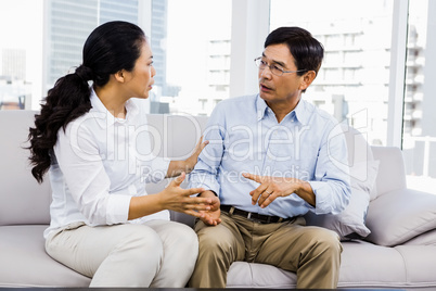 Man and woman with glasses of wine