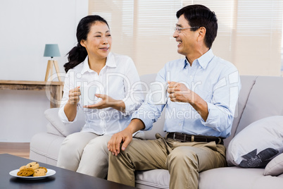 Happy couple together on the couch